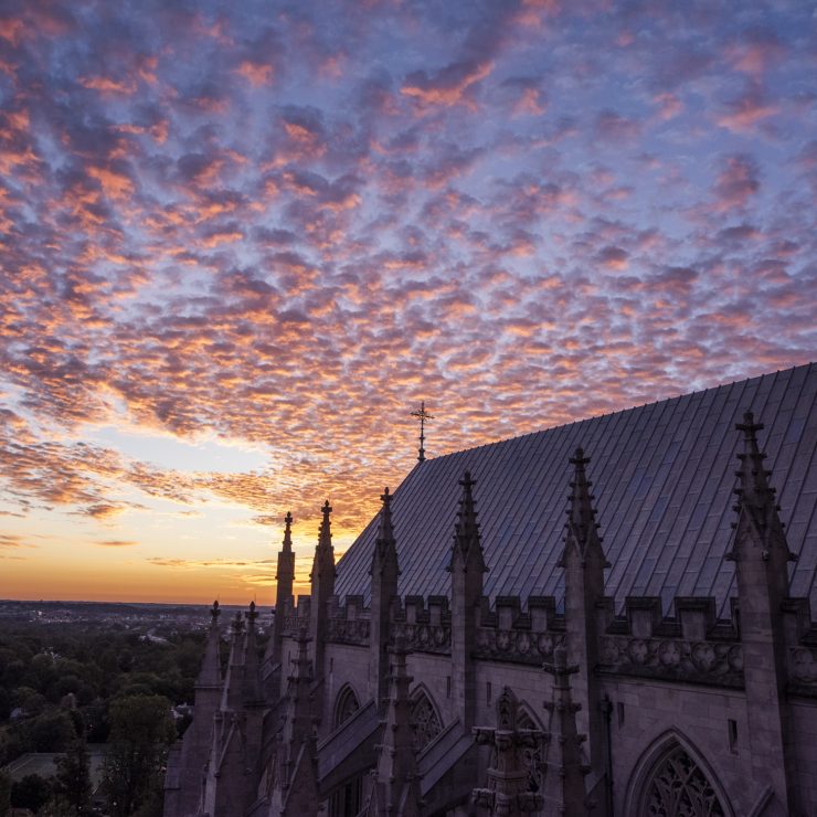 Cloudy sky at dawn over the roof of the Cathedral