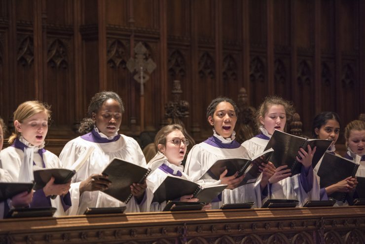 Choristers singing in the Great Choir during Evensong