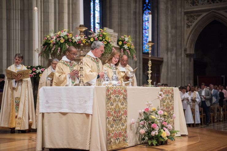 Clergy and congregation celebrating Eucharist at Easter