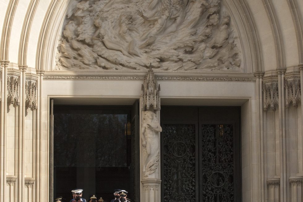 Photograph showing Ex Nihilo carving, taken during Senator Bob Dole funeral at the Cathedral